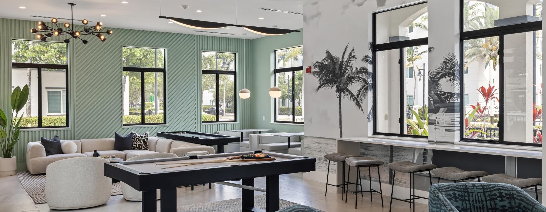 lounge with a colored wall and some decor