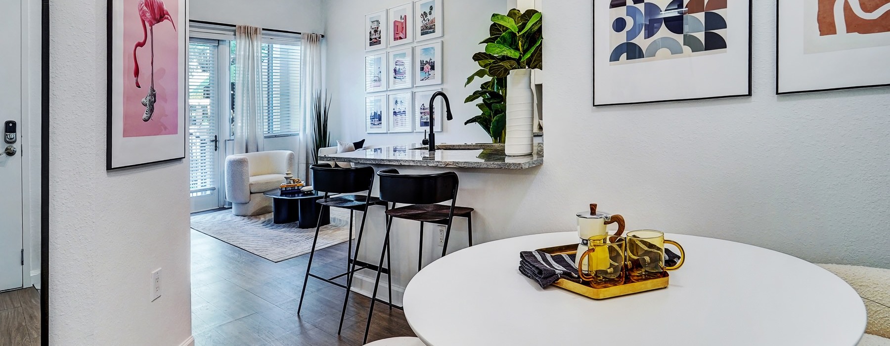 a room with a table and chairs
