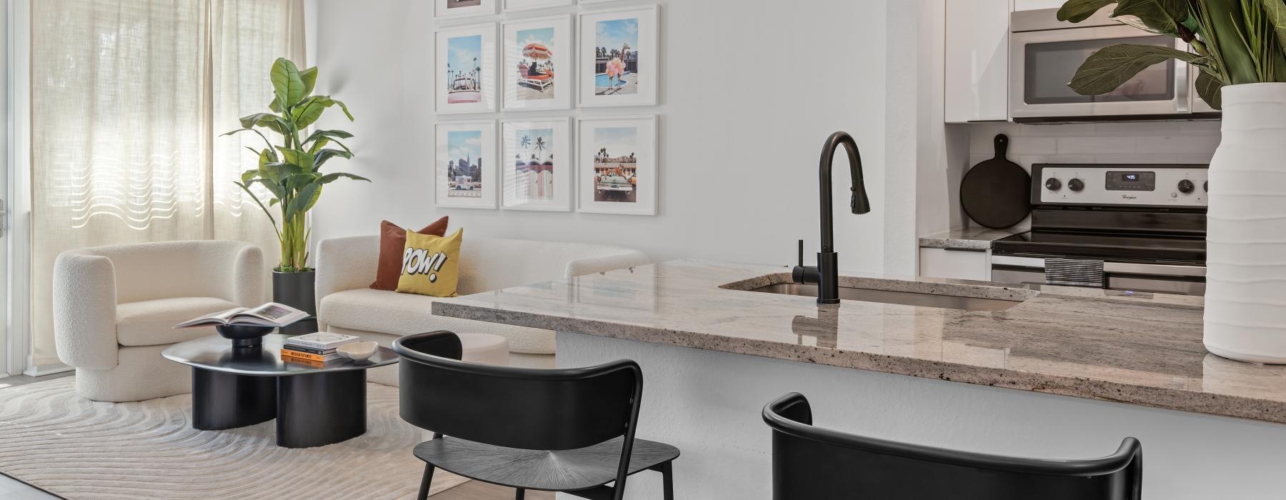 a kitchen with a table and chairs